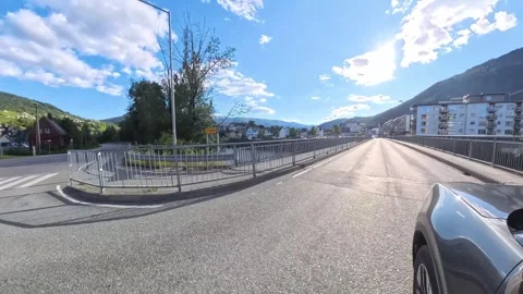 POV Driving Across the Main River Bridge in Voss Town Center, Norway Stock Footage 341800849