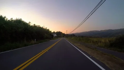 POV Driving alone at Sunset over idyllic lowlands, Marin County, California. 스톡 동영상 97715328