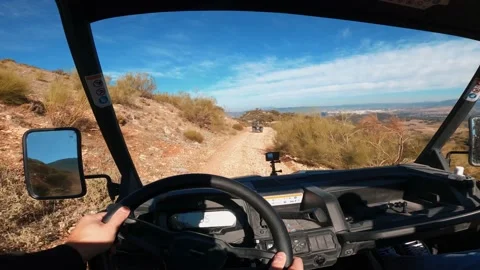 POV driving a buggy UTV ATV on desert off-road in Ronda, Spain, on a sunny day Stock Footage 171929409