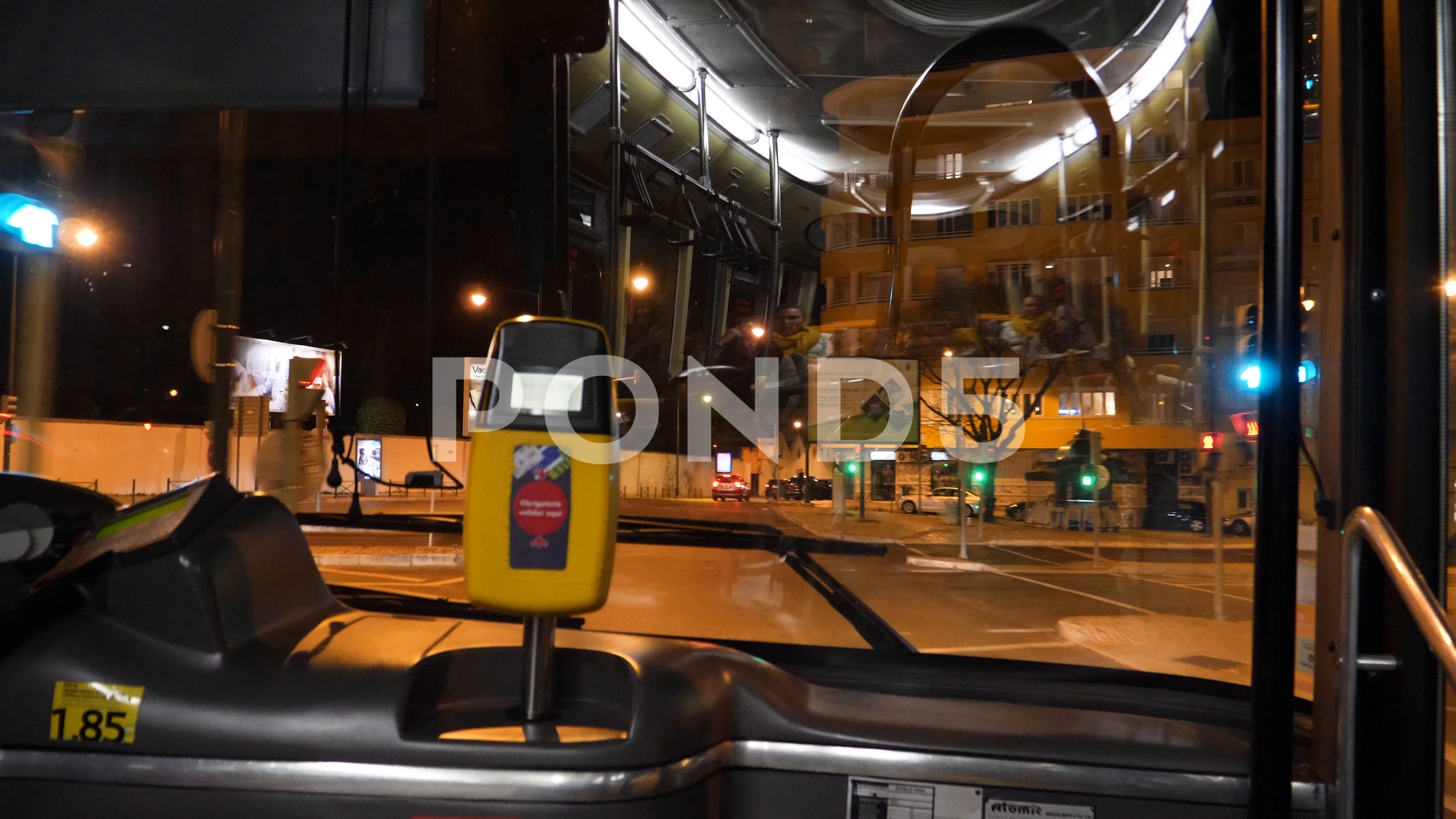 POV driving bus front row window city night Lisbon