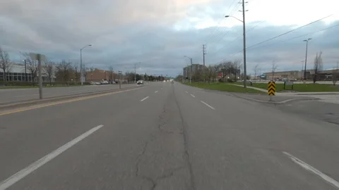 POV driving city streets empty and shopping mall in COVID 19 pandemic lockdown Stock-Footage 153059163