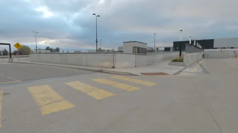 POV driving city streets empty and shopping mall in COVID 19 pandemic lockdown Видео 153064516