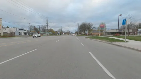 POV driving city streets empty and shopping mall in COVID 19 pandemic lockdown Stock-Footage 153072531