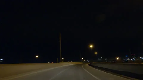 POV driving on dark empty city streets during COVID 19 pandemic lockdown Vídeos de archivo 147890162