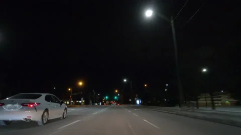 POV driving on dark empty city streets during COVID virus pandemic lock down Stockbeeldmateriaal 147911699