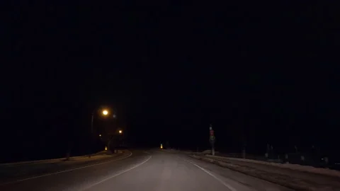 POV driving on dark empty city streets during COVID virus pandemic lock down Vídeo Stock 147920829