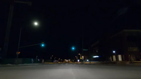POV driving on dark empty city streets during COVID virus pandemic lock down Stockbeeldmateriaal 147922807