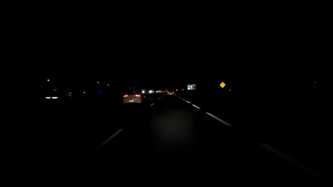 POV driving in the dark on highway at ni... | Stock Video | Pond5