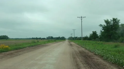 POV driving down a dirt road in Kansas 스톡 동영상 40356866