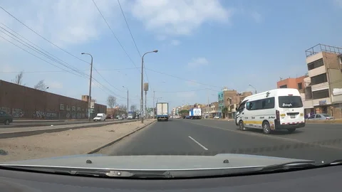 Pov driving down Tomas Valle avenue, Lima, Peru - January 2021 Video stock 147469820