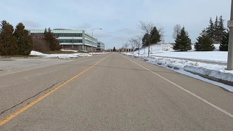 POV driving in empty college and university town in COVID 19 pandemic Видео 147371924