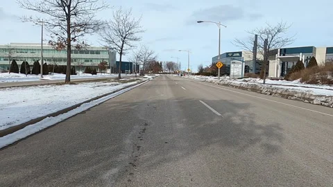 POV driving in empty college and university town in COVID 19 pandemic Vídeo Stock 147372038