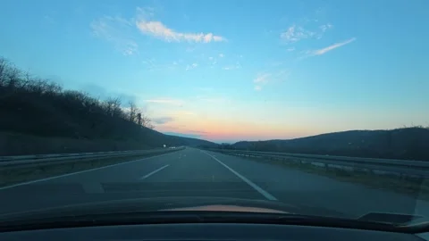 POV Driving on Empty Highway at Dusk – Blue and Purple Sky Video stock 331063482