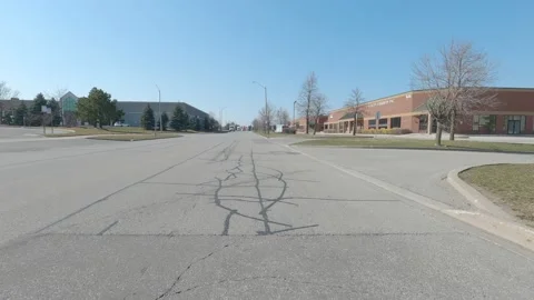 POV driving in empty industrial area in COVID 19 pandemic lockdown recession Vídeo Stock 151690010
