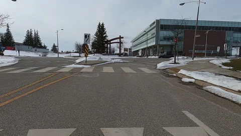 POV driving in empty Waterloo college and university town in COVID 19 pandemic Stock Footage 147371713