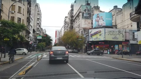 POV Driving Forward Along Corrientes Avenue Symbolizing Buenos Aires Downtown Stock Footage 342296570