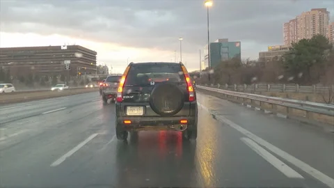 POV driving in heavy rush hour highway traffic in the rain Stock-Footage 150396181