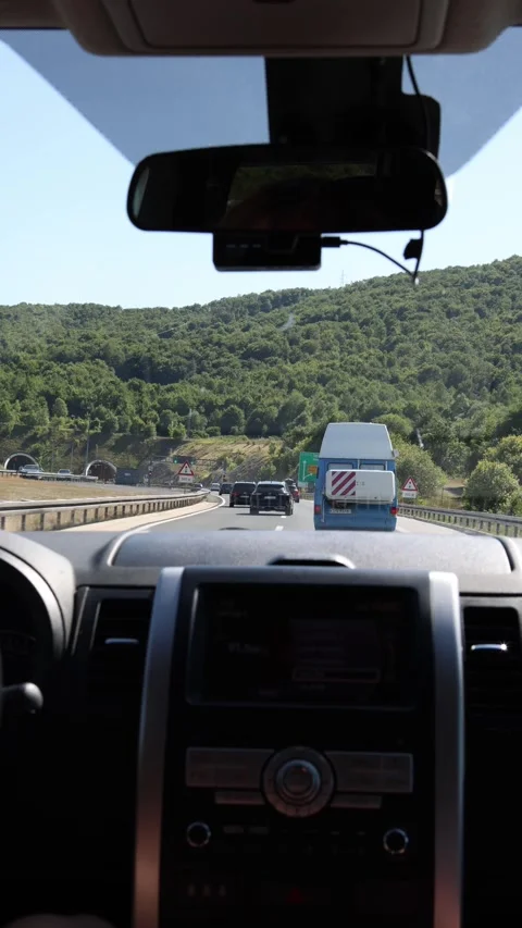 POV driving on highway with electronic speed limit signs Stock Footage 341321222