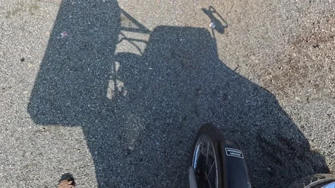POV driving hot moving forward, camera focusing on the front wheel. Stock Footage 339391750