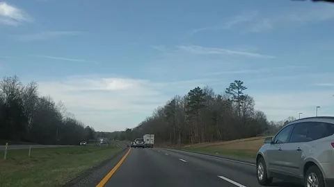 POV driving interstate 26 West with blue skys trees and traffic 2 Stock-Footage 149579652