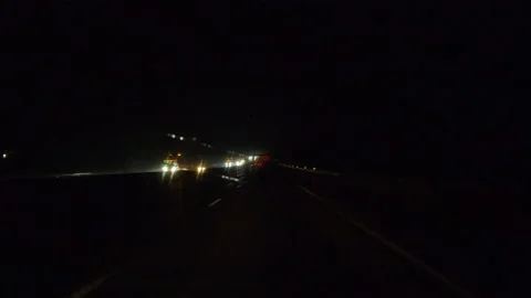 POV driving on a pitch back dark wet rainy night in the city streets Видео 156739751