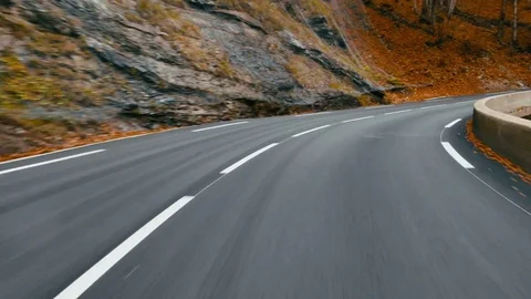 POV DRIVING PLATE Car driving on a forest road in the mountains, no other cars Stock Footage 82878806