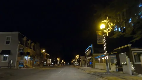 POV driving plate on dark empty city streets during COVID pandemic lockdown Stock Footage 147937780