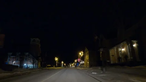 POV driving plate on dark empty city streets during COVID pandemic lockdown Stock Footage 147938780
