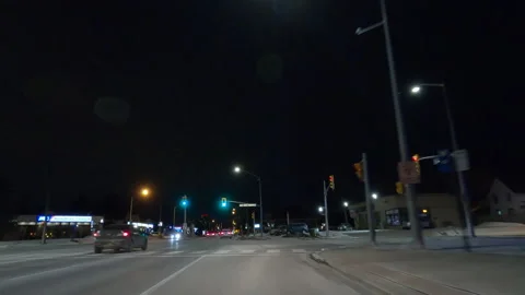 POV driving plate on dark empty city streets during COVID pandemic lockdown Vídeos de archivo 147940448