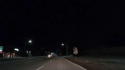 POV driving plate on dark empty streets during COVID recession lockdown Video stock 147950144