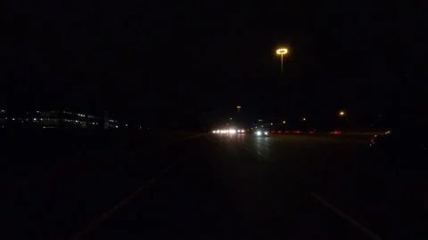 POV driving plate reverse rear view show on a very dark night on the streets Video stock 153319586