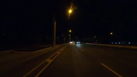 POV driving plate reverse rear view show on a very dark night on the streets Stock-Footage 153325982
