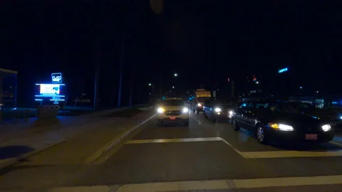POV driving plate reverse rear view show on a very dark night on the streets Vídeo Stock 153326887