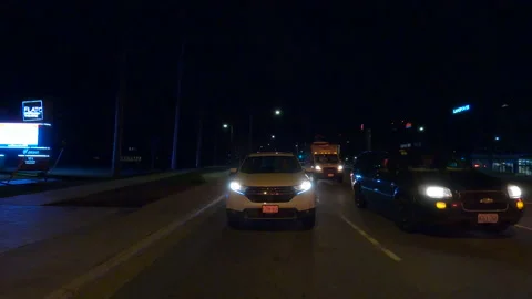 POV driving plate reverse rear view show on a very dark night on the streets Stock-Footage 153327378