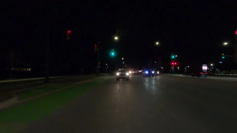 POV driving plate reverse rear view show on a very dark night on the streets Видео 153327993