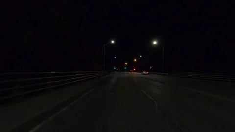 POV driving plate reverse rear view show on a very dark night on the streets Stock-Footage 153330702