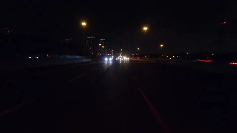 POV driving plate reverse shot roads and highways on a very dark night 스톡 동영상 155895814