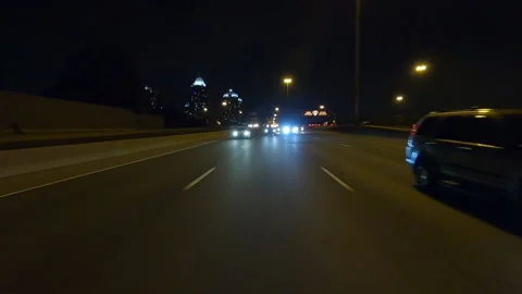 POV driving plate reverse shot roads and highways on a very dark night Видео 155896116
