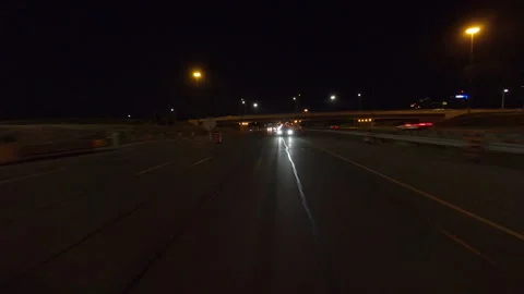 POV driving plate reverse shot roads and highways on a very dark night 스톡 동영상 155898397