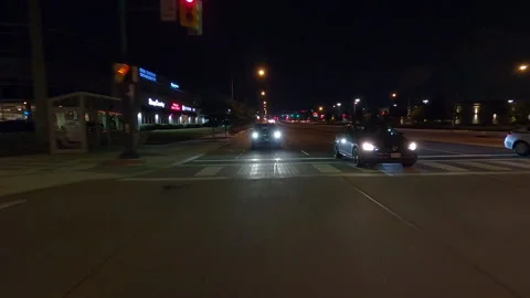 POV driving plate reverse shot roads and highways on a very dark night Vidéo 155900659