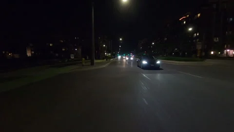 POV driving plate reverse shot roads and highways on a very dark night Vídeo Stock 155901308