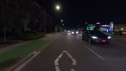 POV driving plate reverse shot roads and highways on a very dark night Stockbeeldmateriaal 155901383