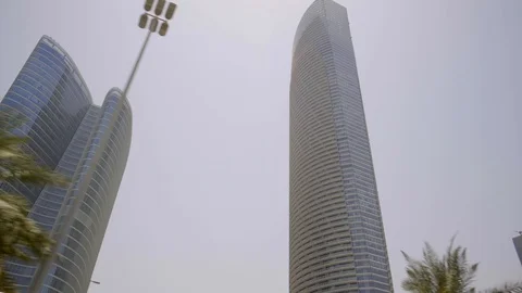 Pov driving plate side view with a view of The Landmark Abu Dhabi building Stock Footage 104963851