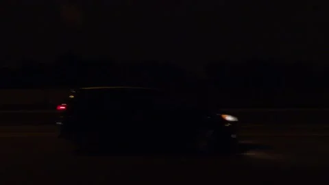 POV driving plate side view city streets on a dark night Vídeos de archivo 149460365