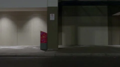 POV driving plate side view of closed retail stores at night in COVID lockdown Vídeos de archivo 149464756