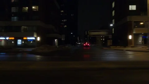POV driving plate with side view on dark city streets at night with buildings Stock Footage 149468078
