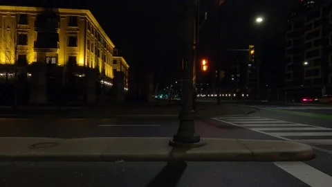 POV driving plate with side view on dark city streets at night with buildings Vídeos de archivo 149468336