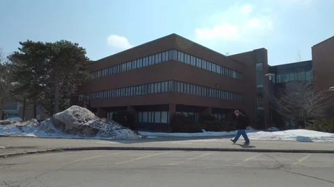 POV driving plate side view of empty university campus in COVID pandemic Vídeo Stock 149930203