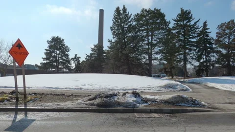 POV driving plate side view of empty university campus in COVID pandemic Video stock 149931403