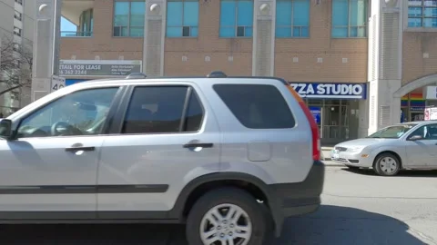 POV driving plate side view downtown Toronto city streets Vídeos de archivo 150795257